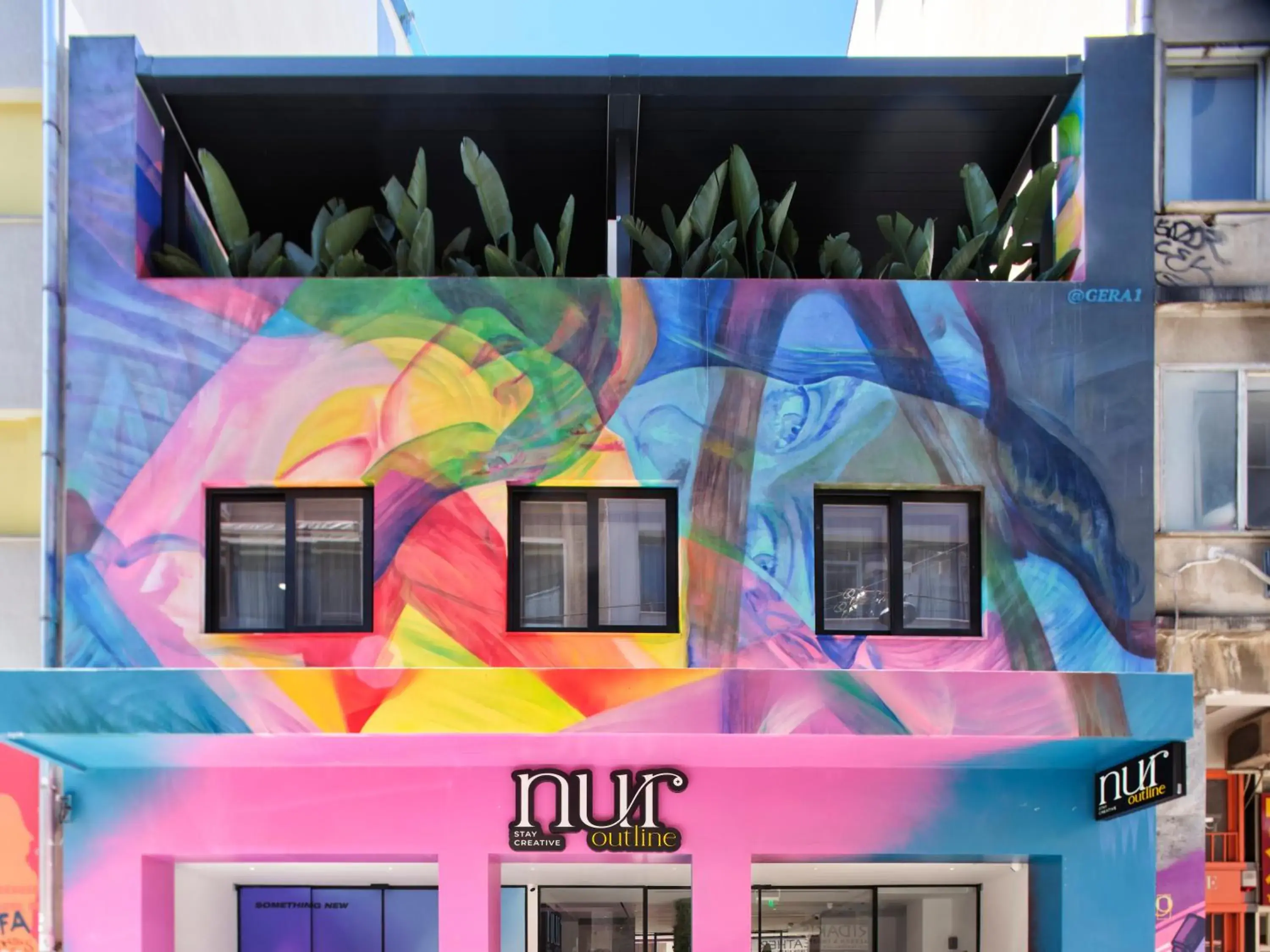 Property building in Nur Outline Aparthotel Property building in Nur Outline Aparthotel