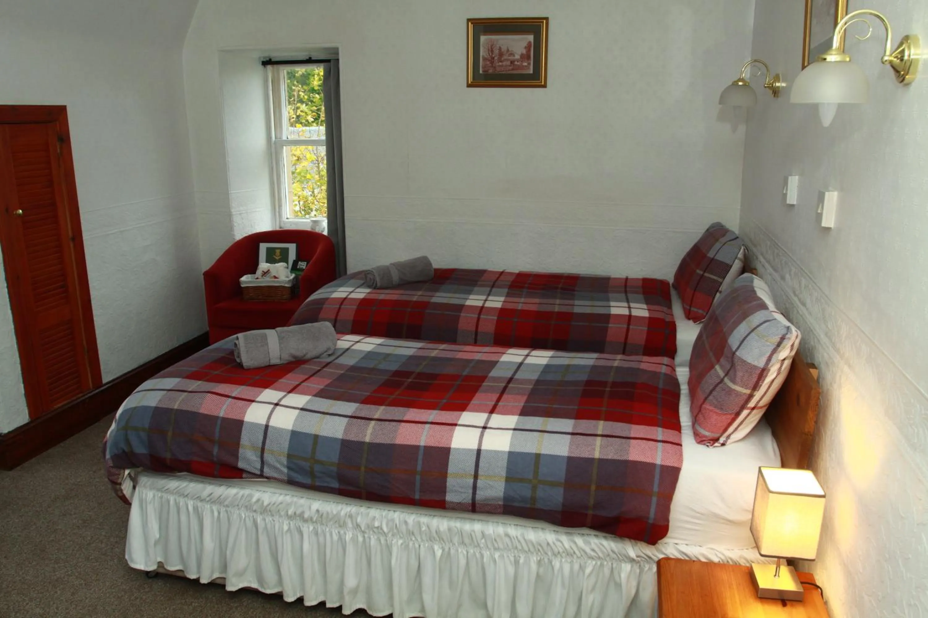 Bed in The Retreat Hotel