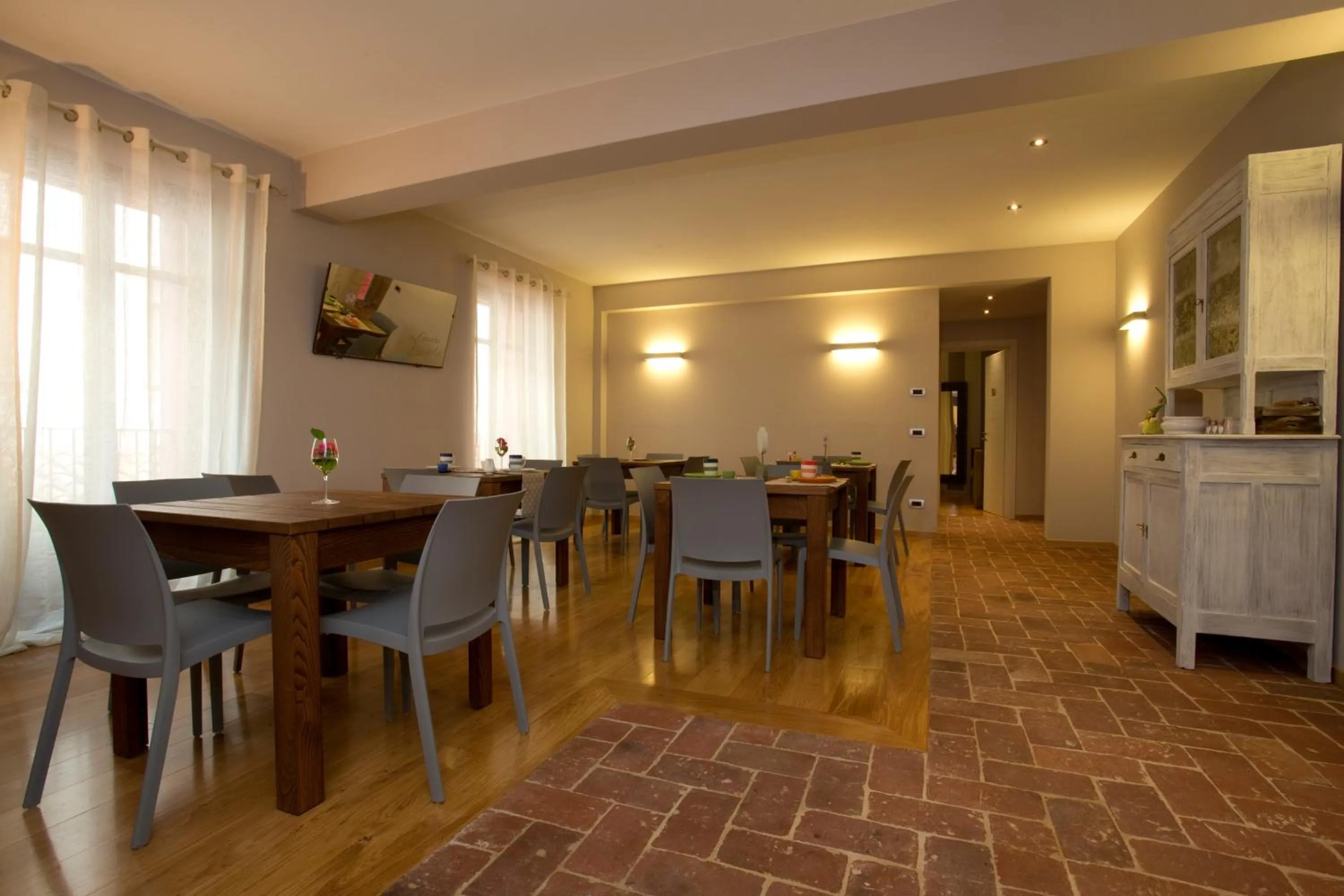 Communal lounge/ TV room in B&B La Ceramica Moline