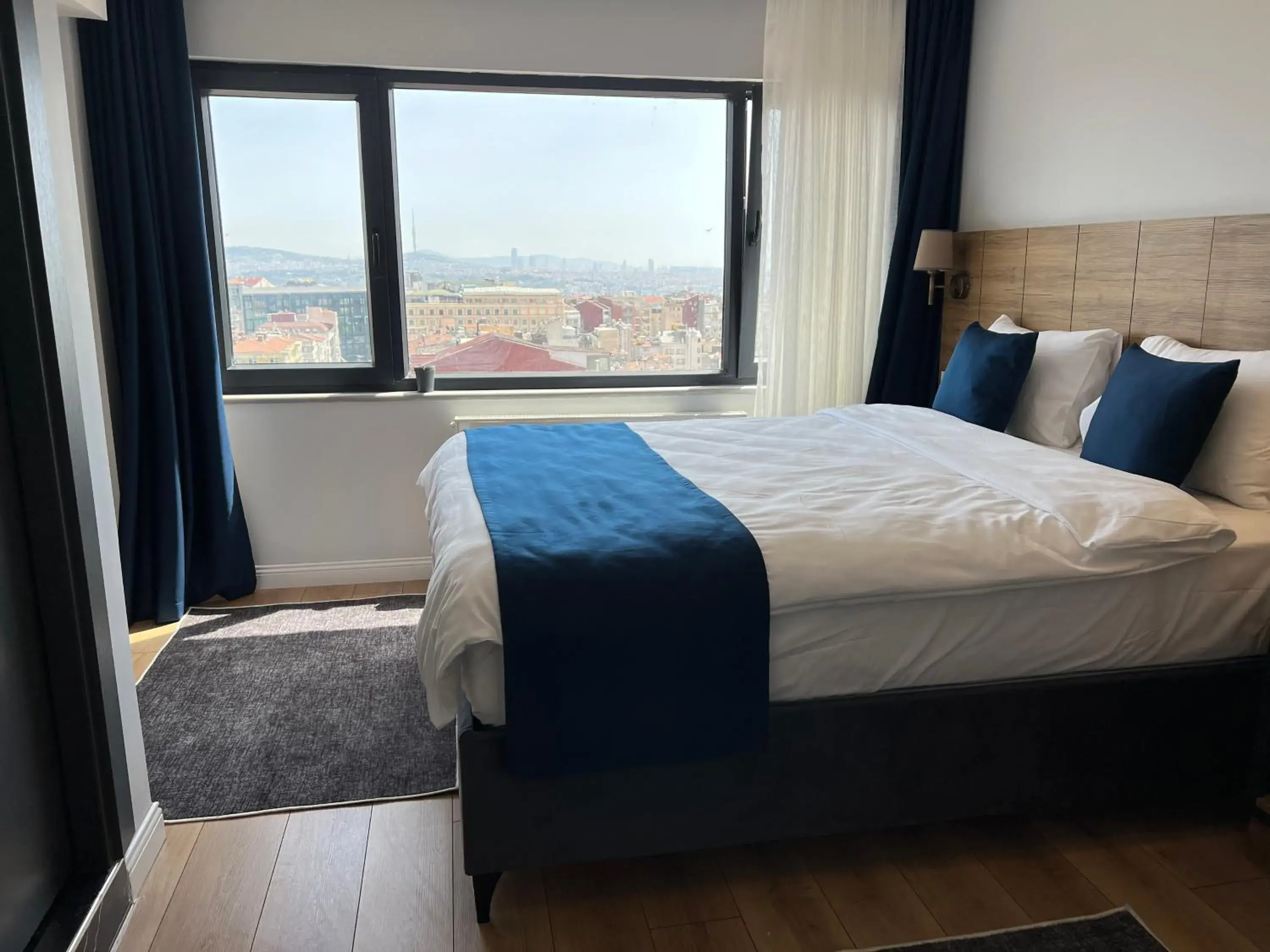 Bed in The Blue Suites Bed in The Blue Suites