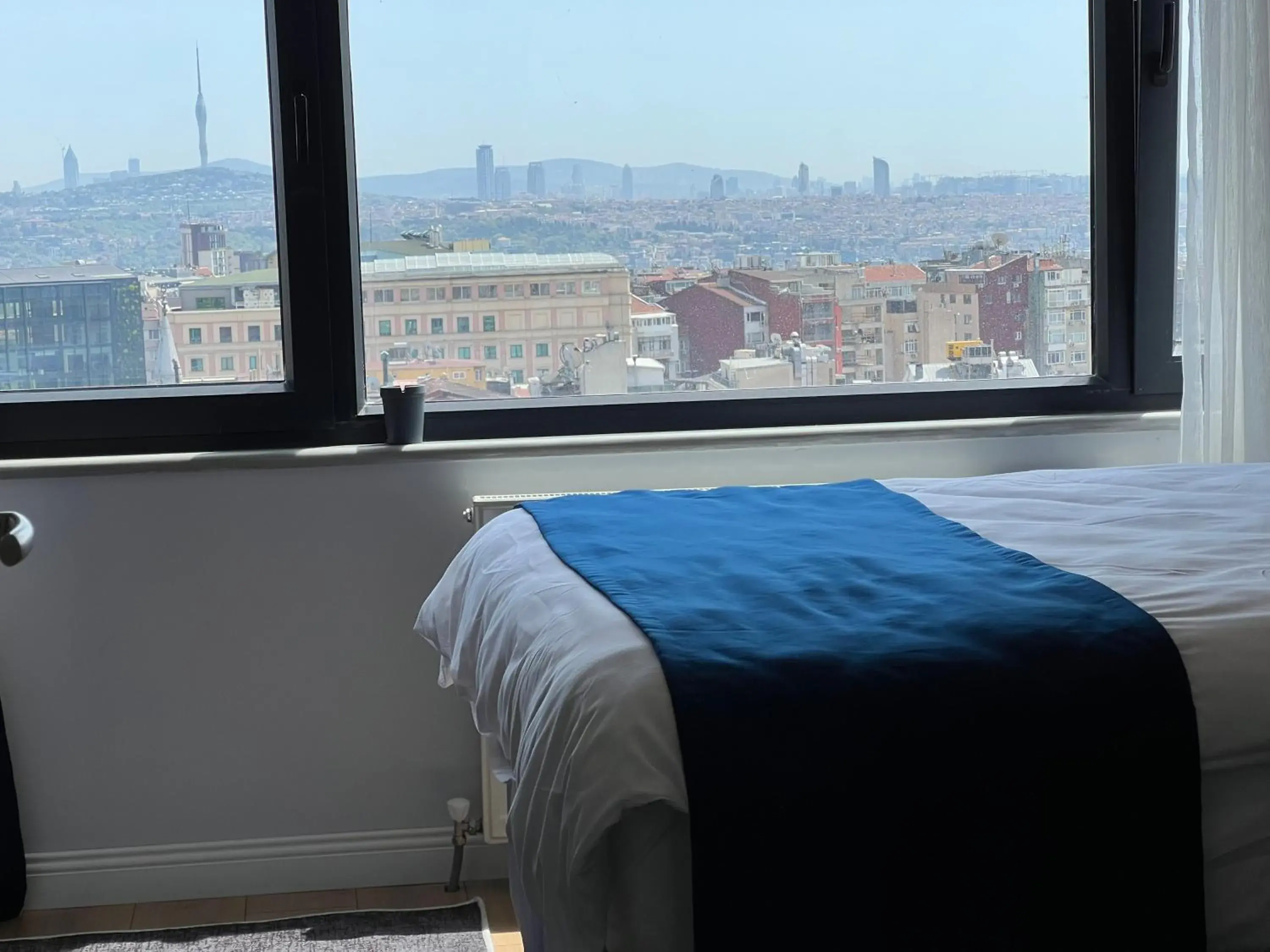 Bed in The Blue Suites Bed in The Blue Suites