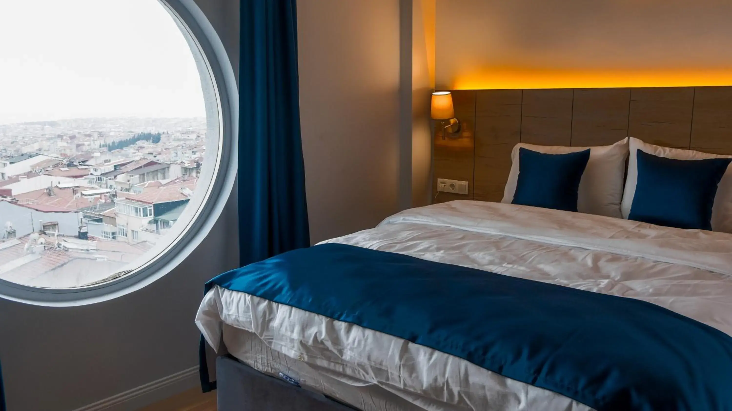 Bed in The Blue Suites Bed in The Blue Suites