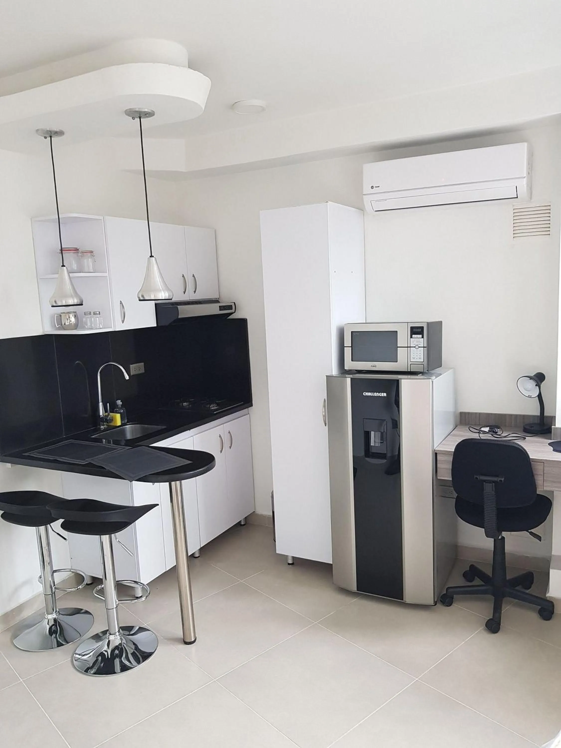 Kitchen or kitchenette in 502 Moderno Aparta-Suite en Versalles Tipo Loft - Cali Tower Suites & Lofts