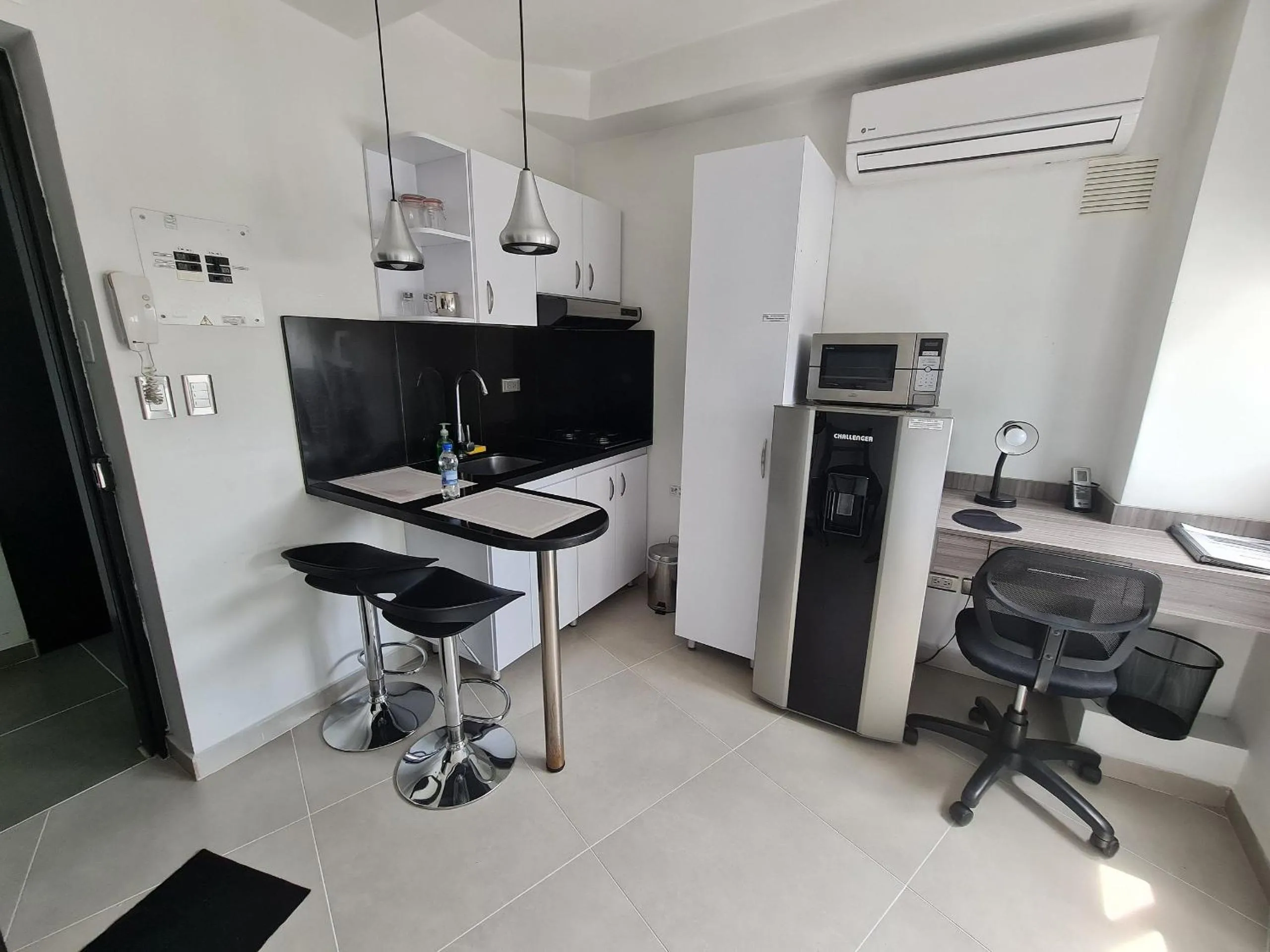 Kitchen or kitchenette in 502 Moderno Aparta-Suite en Versalles Tipo Loft - Cali Tower Suites & Lofts