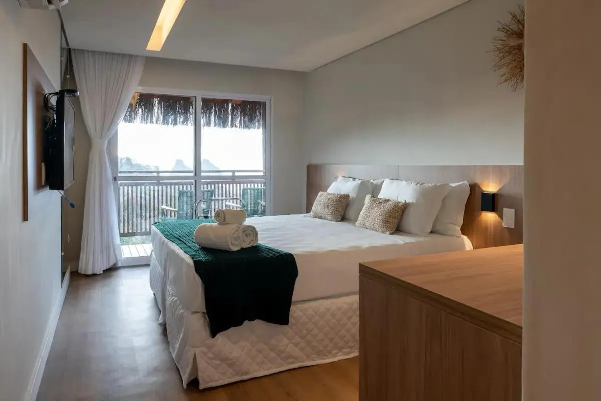 Bed in Pousada Divino Morro