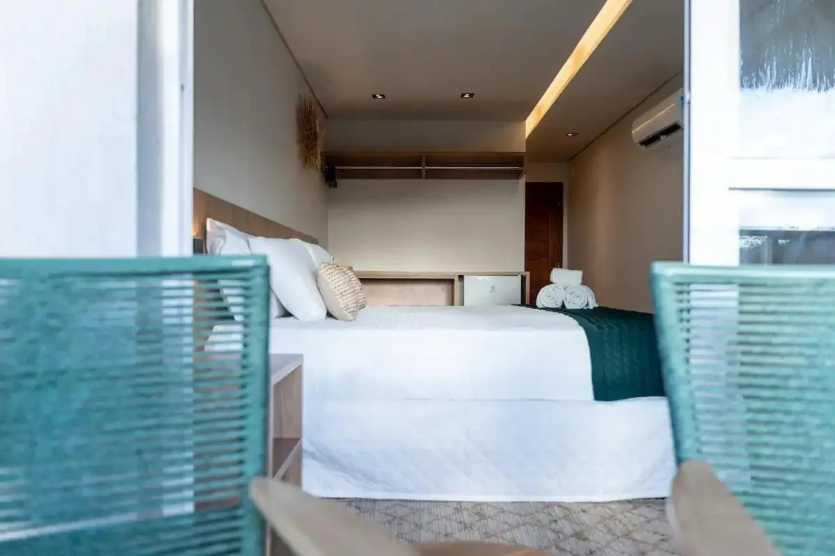 Bed in Pousada Divino Morro