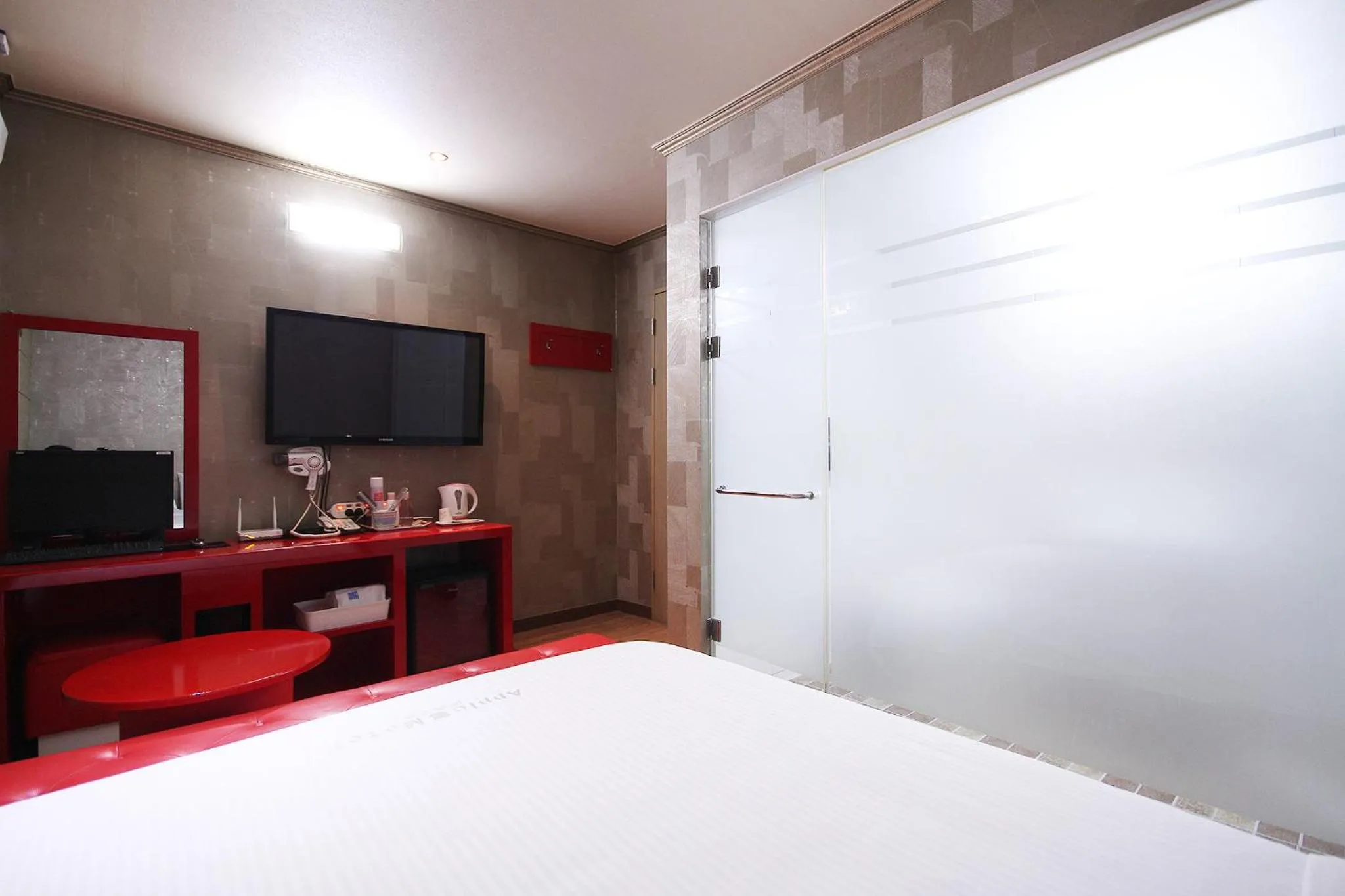 TV and multimedia, TV/Entertainment Center in Apple House Mini Hotel