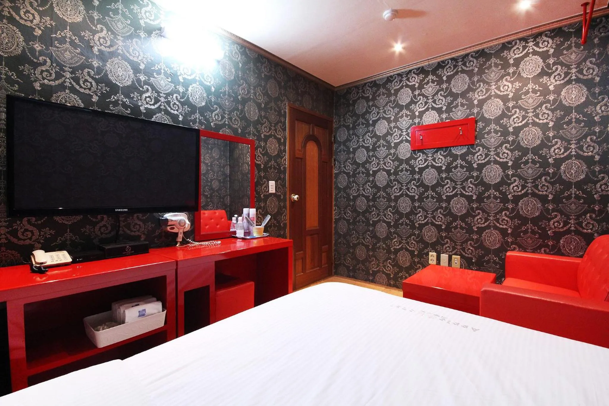 TV and multimedia, TV/Entertainment Center in Apple House Mini Hotel