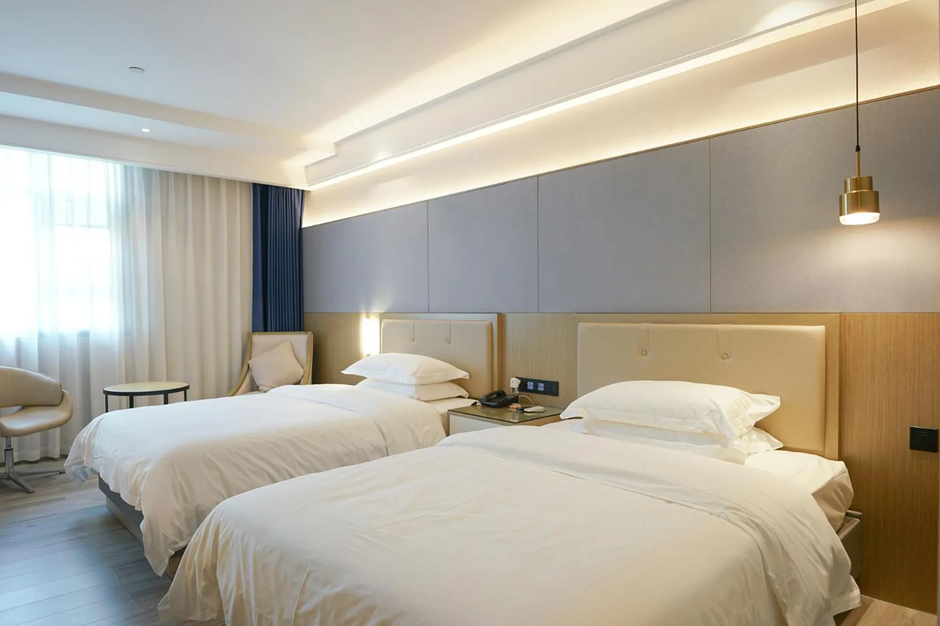 Bed in Paco Hotel Guangzhou North Railway Station