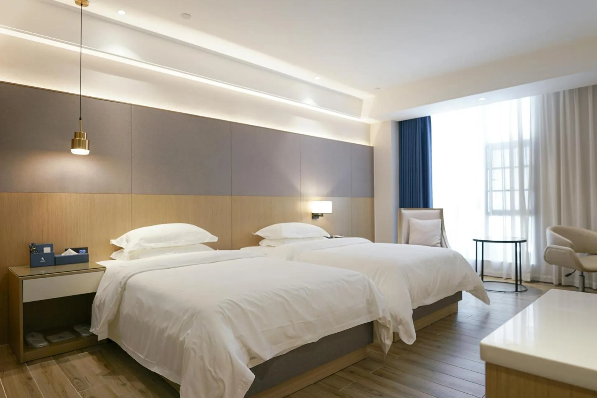 Bed in Paco Hotel Guangzhou North Railway Station