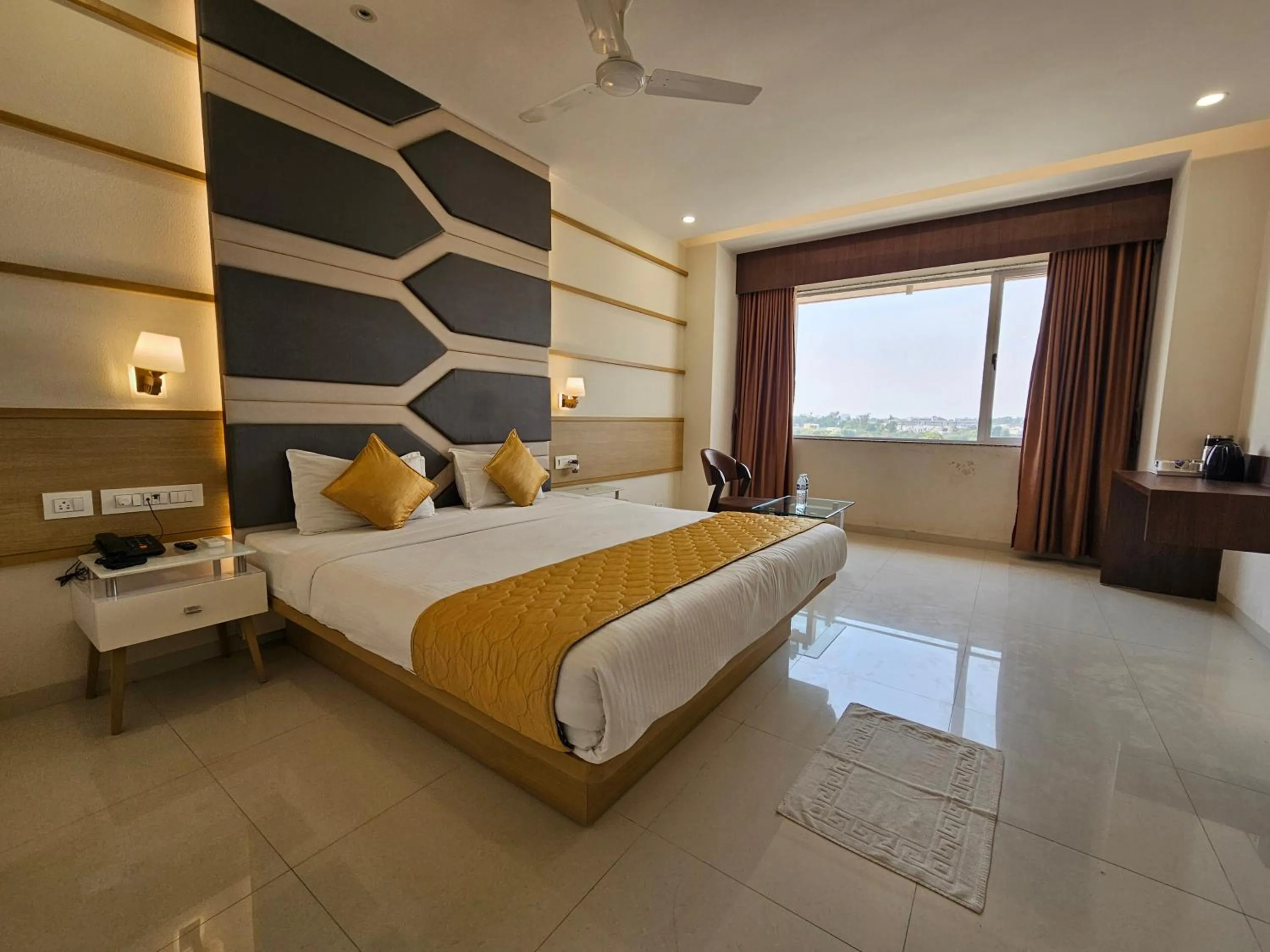 Photo of the whole room, Bed in Hotel Grand Darshan Vadodara