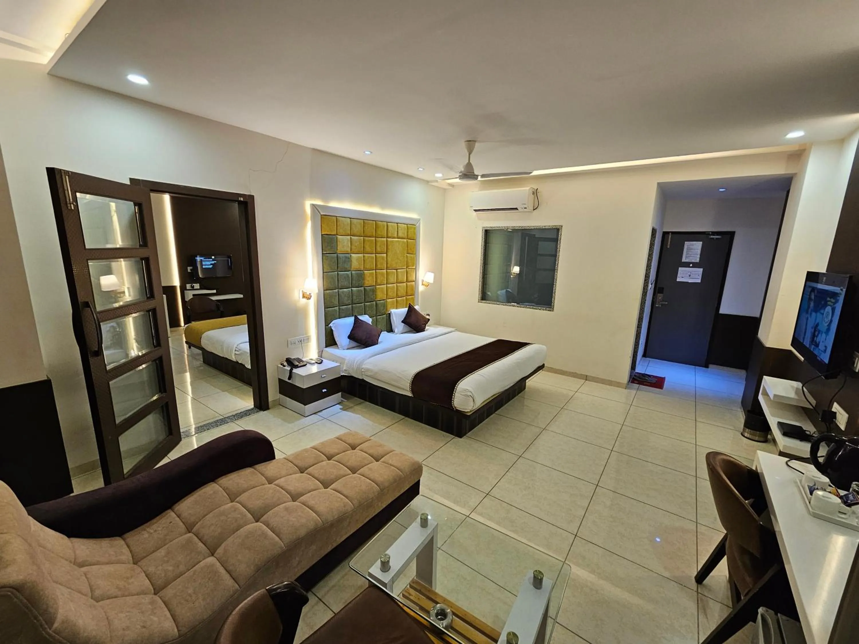 Photo of the whole room, Bed in Hotel Grand Darshan Vadodara