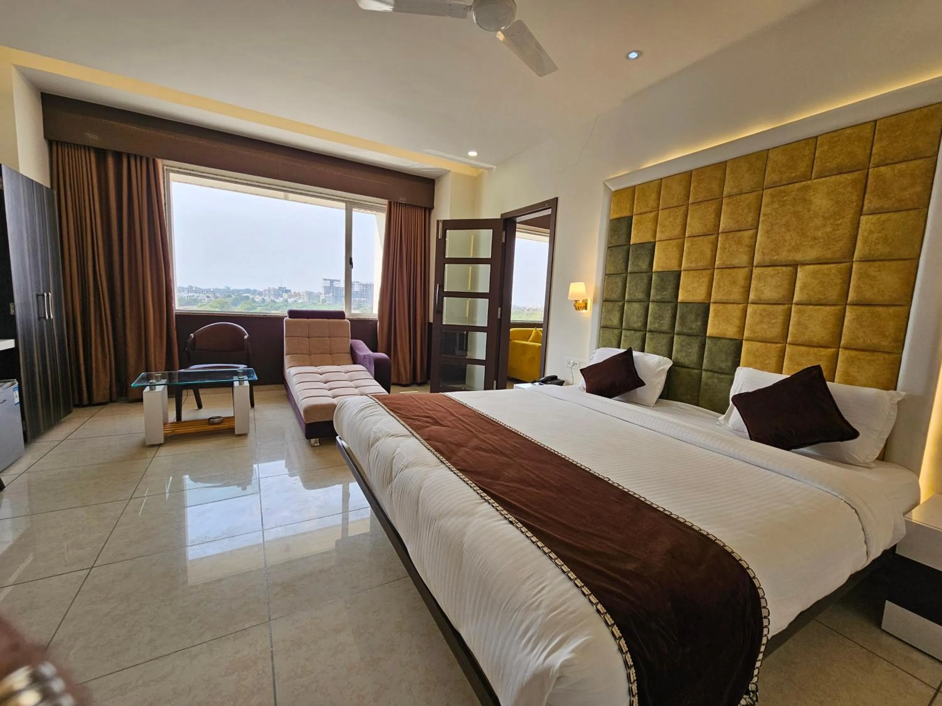 Photo of the whole room, Bed in Hotel Grand Darshan Vadodara