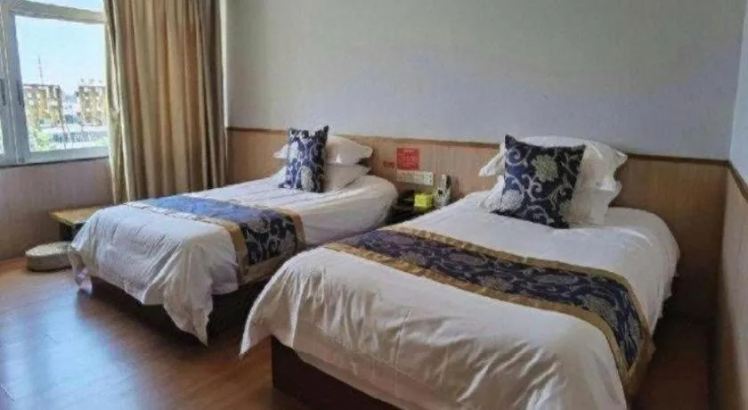 Bed in Yue Lai Yue Hotel