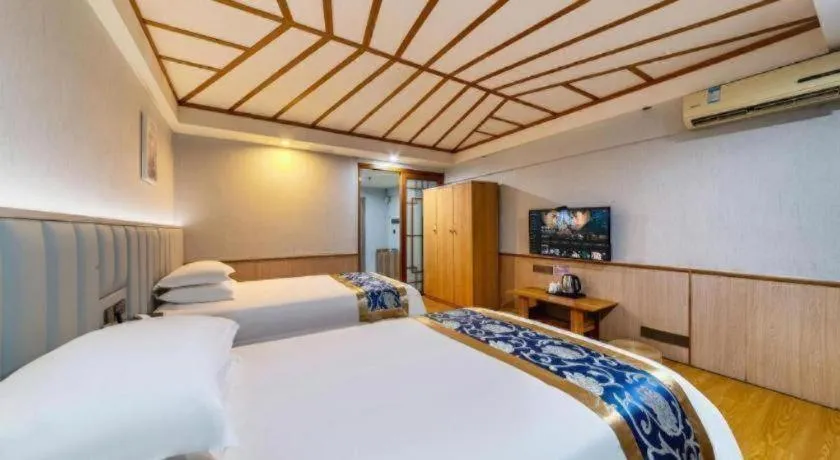 Bed in Yue Lai Yue Hotel
