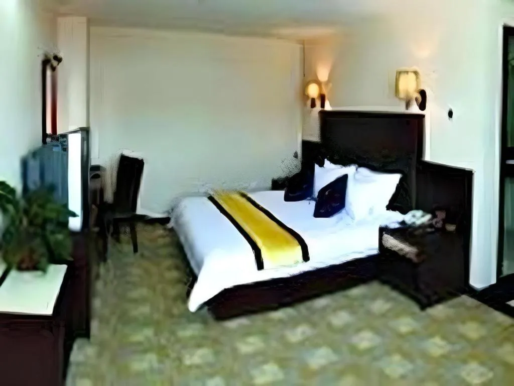 Bed in Yue Lai Yue Hotel