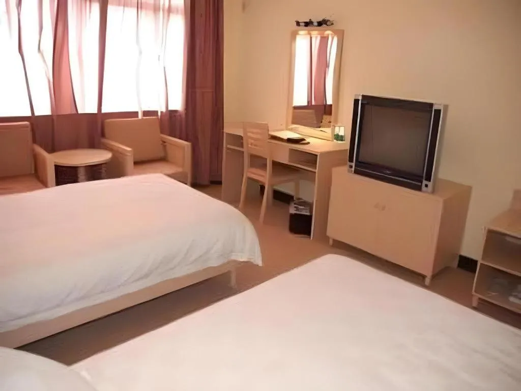 Bed in Yue Lai Yue Hotel