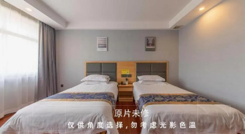 Bed in Yue Lai Yue Hotel