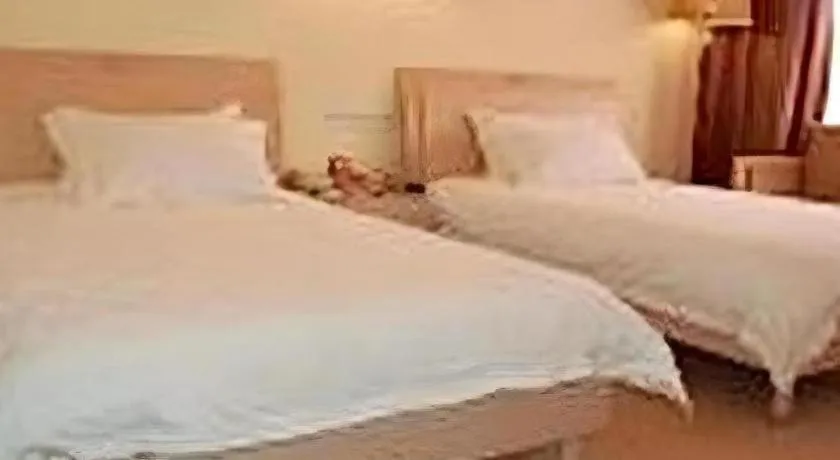 Bed in Yue Lai Yue Hotel