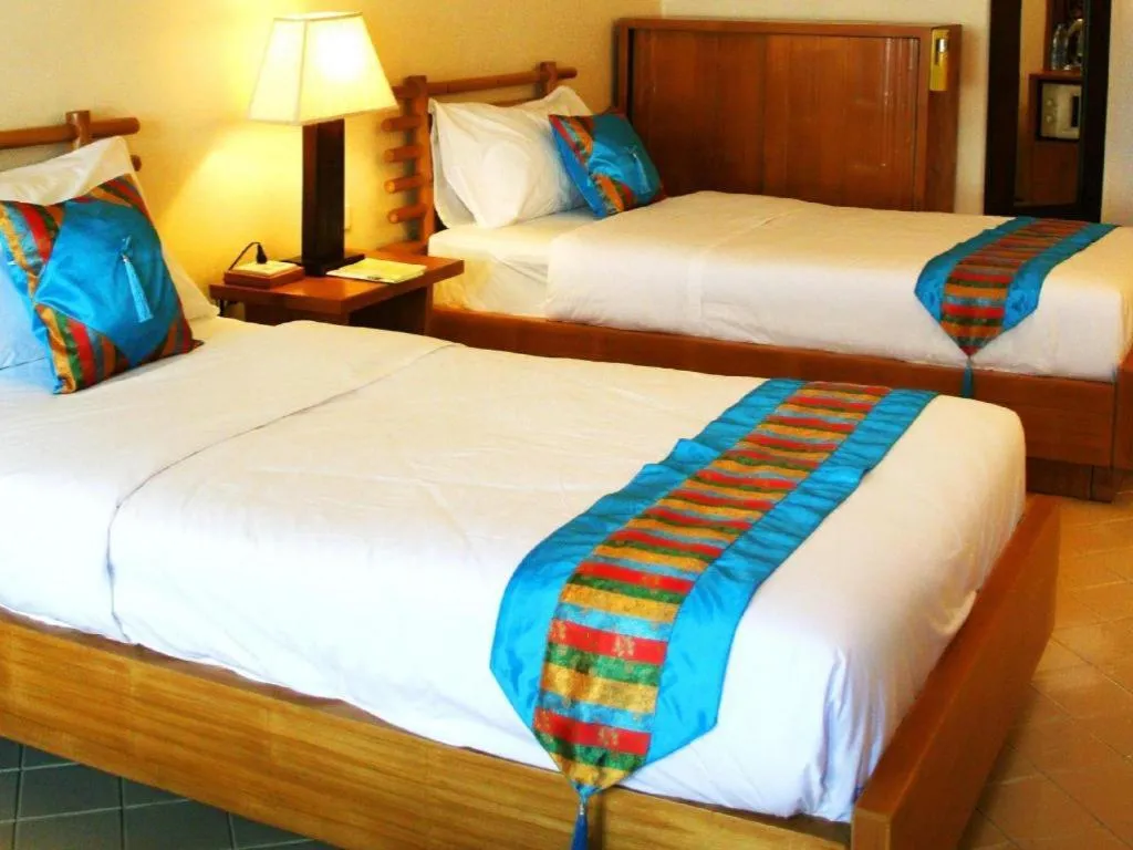 Bed in Gerard Habitat Hotel