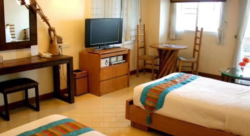 Bed in Gerard Habitat Hotel