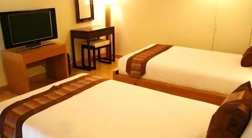 Bed in Gerard Habitat Hotel