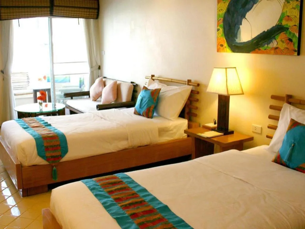 Bed in Gerard Habitat Hotel