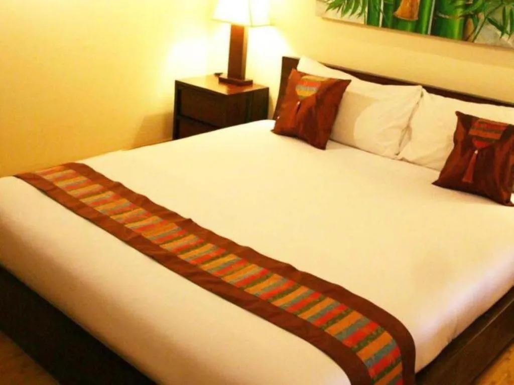 Bed in Gerard Habitat Hotel