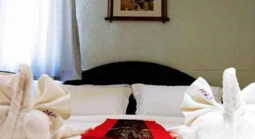 Bed in New Lao Paris Hotel Bed in New Lao Paris Hotel