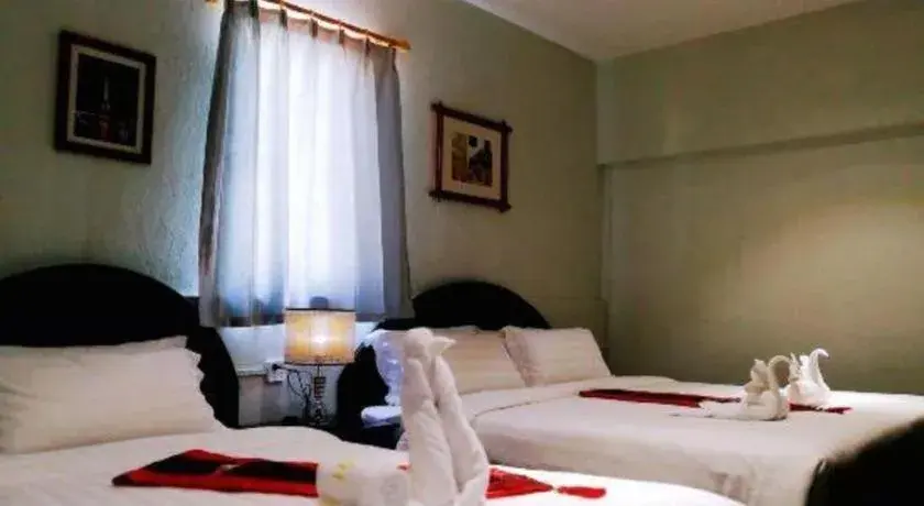 Bed in New Lao Paris Hotel Bed in New Lao Paris Hotel