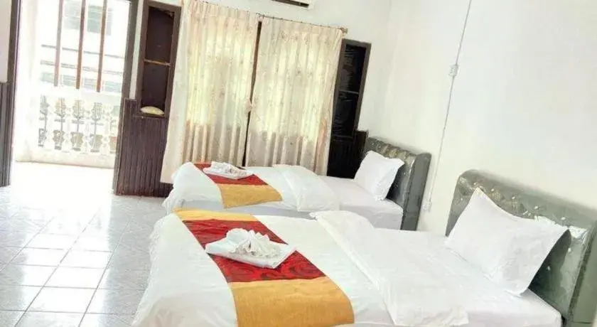 Bed in New Lao Paris Hotel Bed in New Lao Paris Hotel