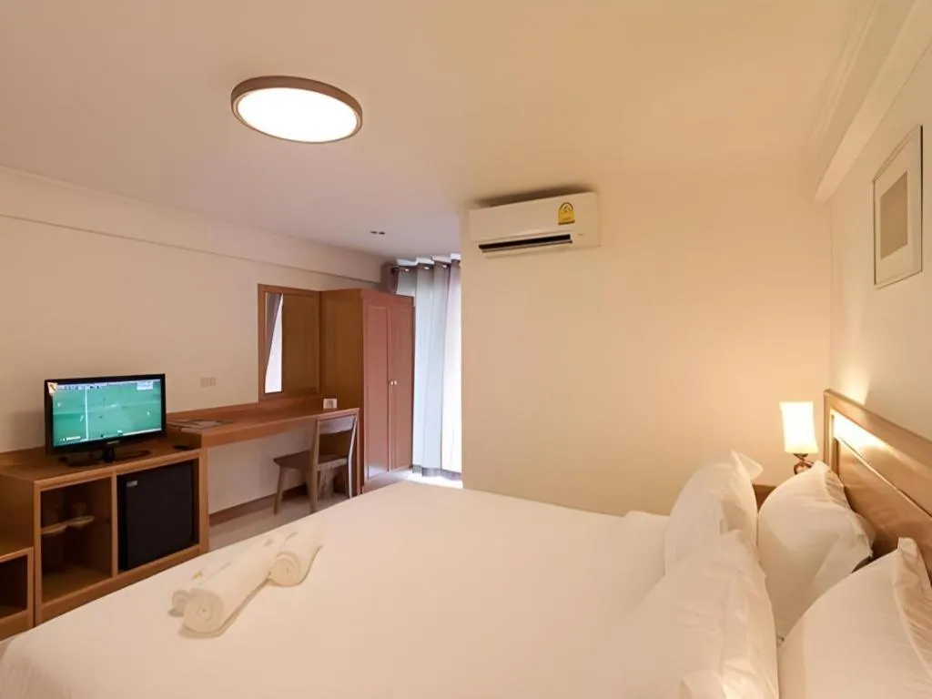 Bed in Muanmanee Boutique Hotel