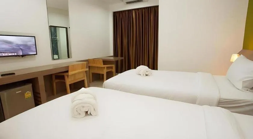 Bed in Soontree House Hotel