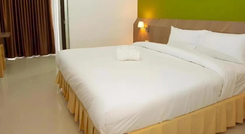 Bed in Soontree House Hotel