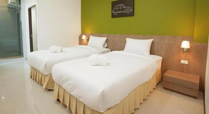 Bed in Soontree House Hotel