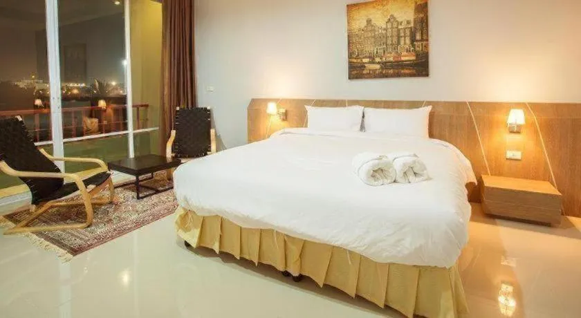 Bed in Soontree House Hotel