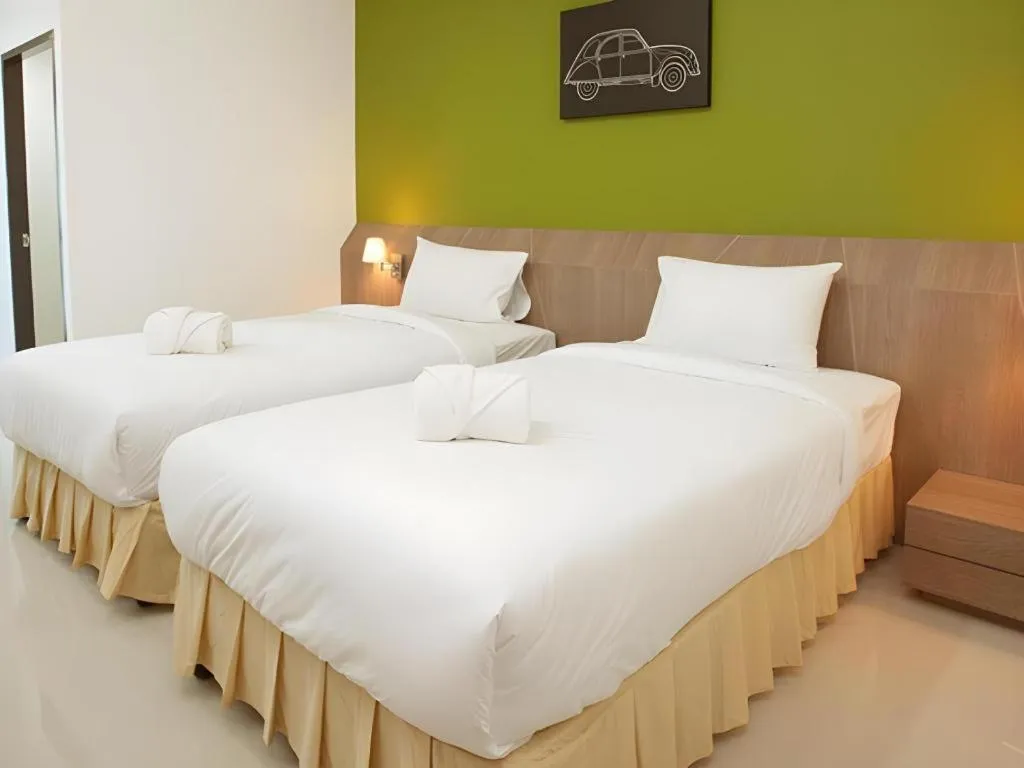 Bed in Soontree House Hotel