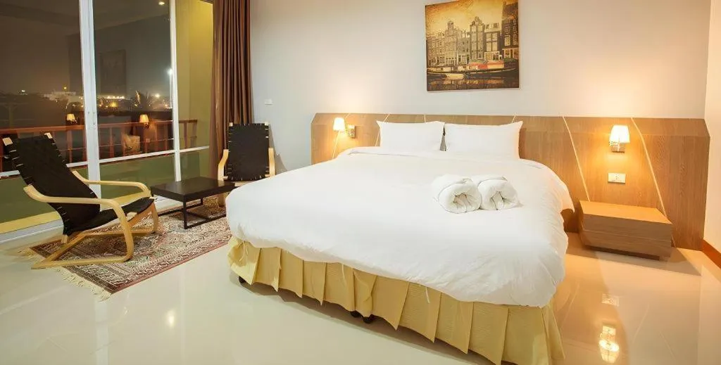 Bed in Soontree House Hotel