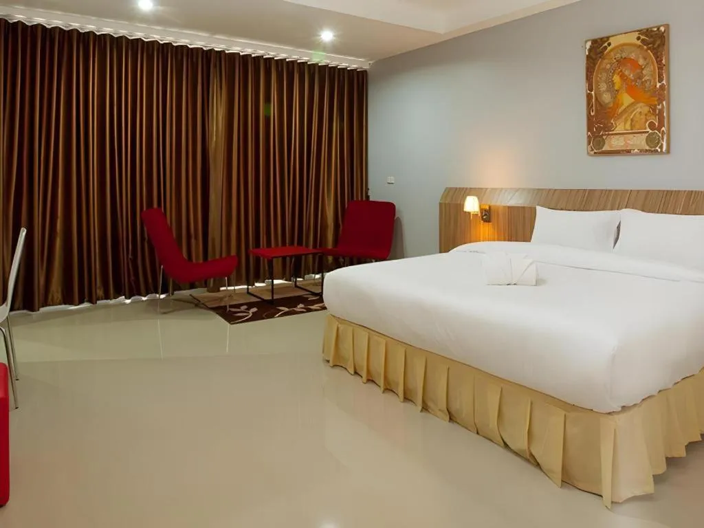 Bed in Soontree House Hotel