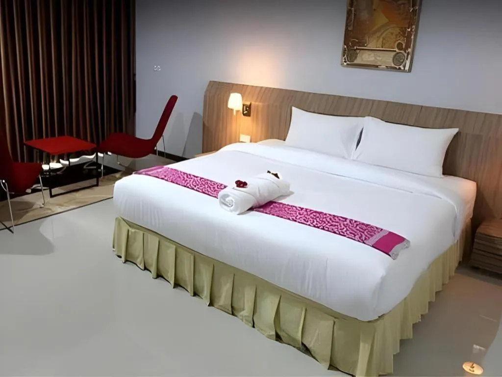 Bed in Soontree House Hotel