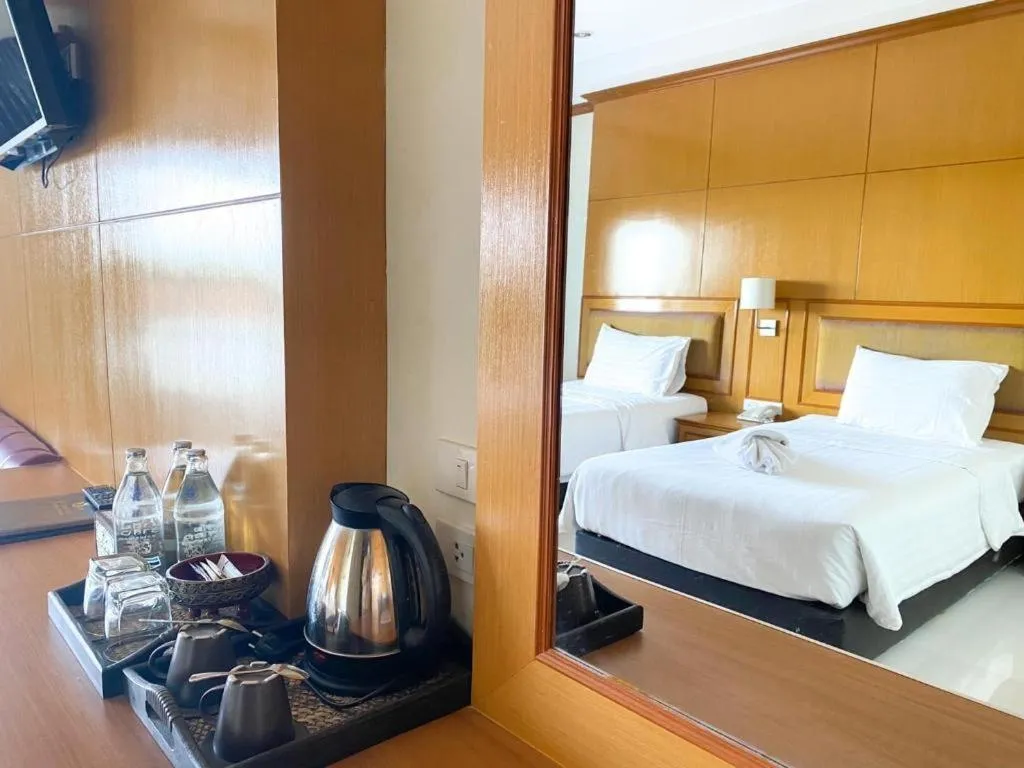 Bed in Siamtara Palace Hotel