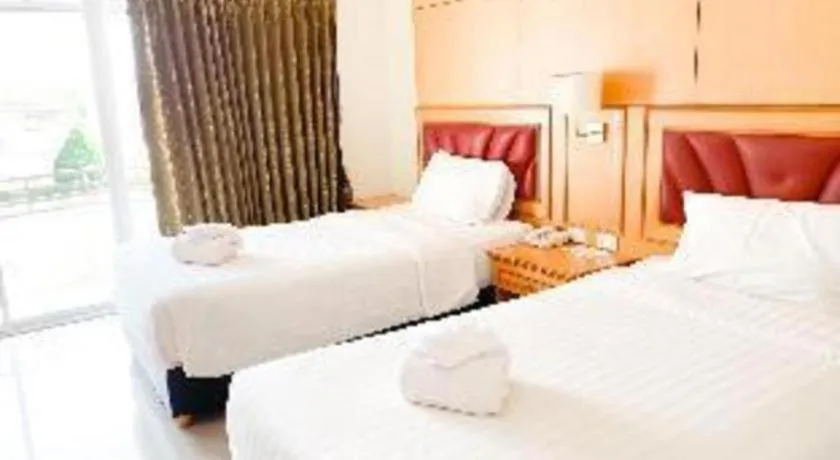 Bed in Siamtara Palace Hotel