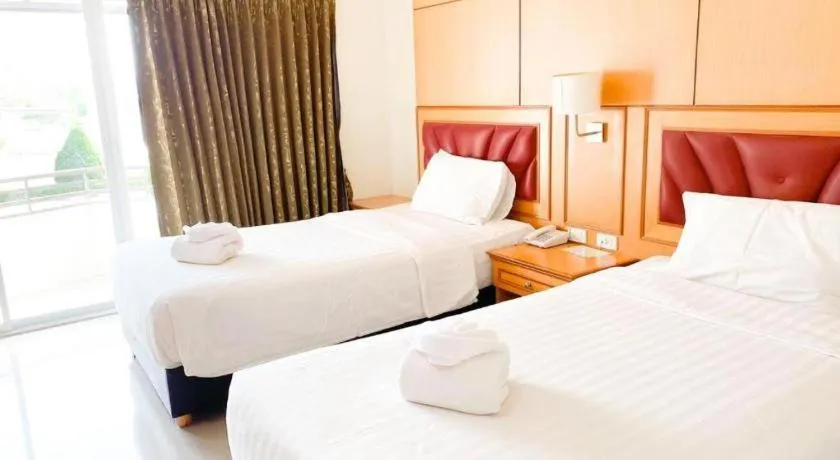 Bed in Siamtara Palace Hotel