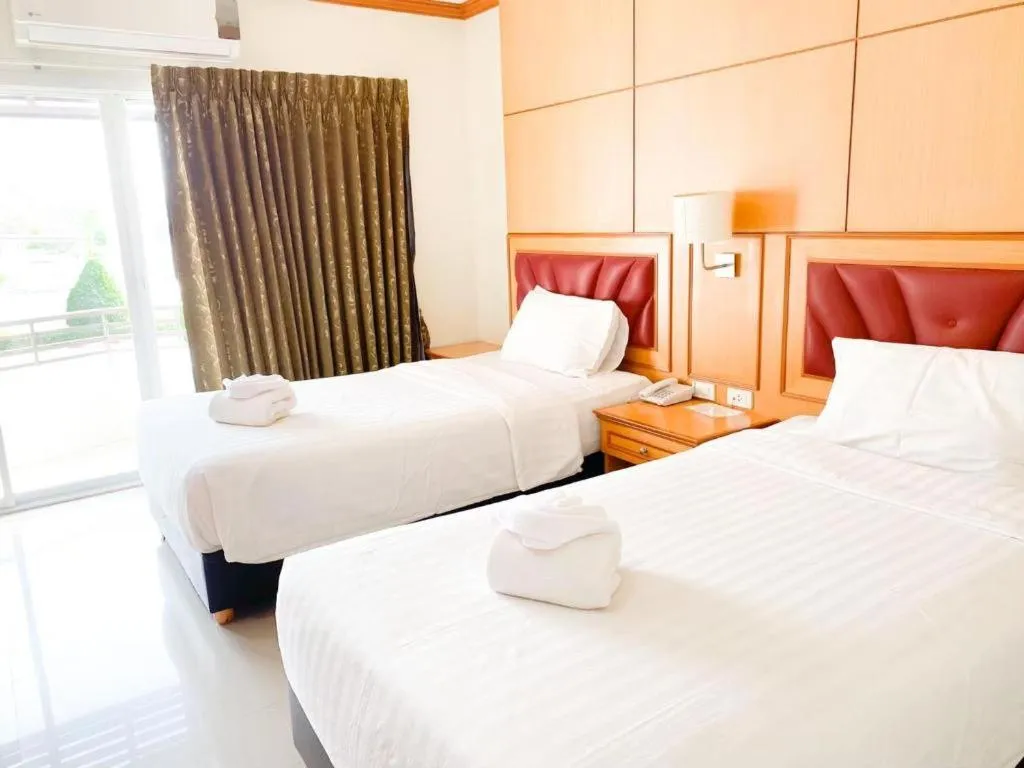 Bed in Siamtara Palace Hotel