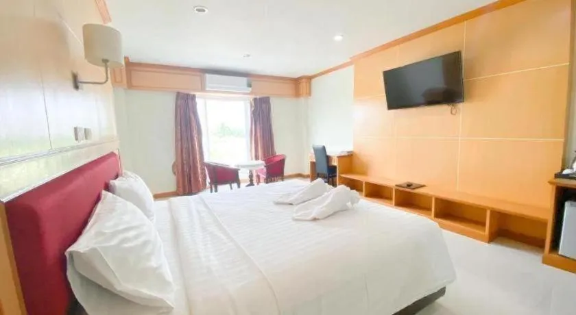 Bed in Siamtara Palace Hotel