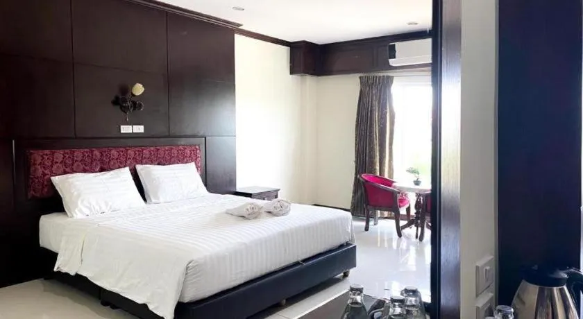 Bed in Siamtara Palace Hotel