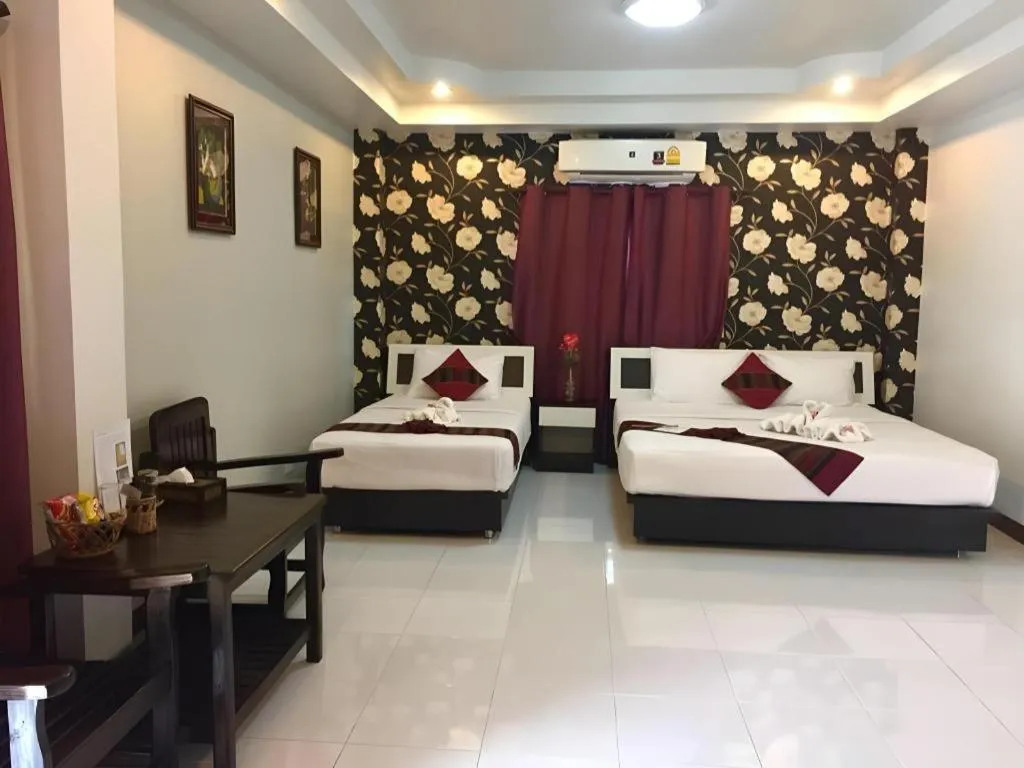 Bed in Nan Treasure Hotel