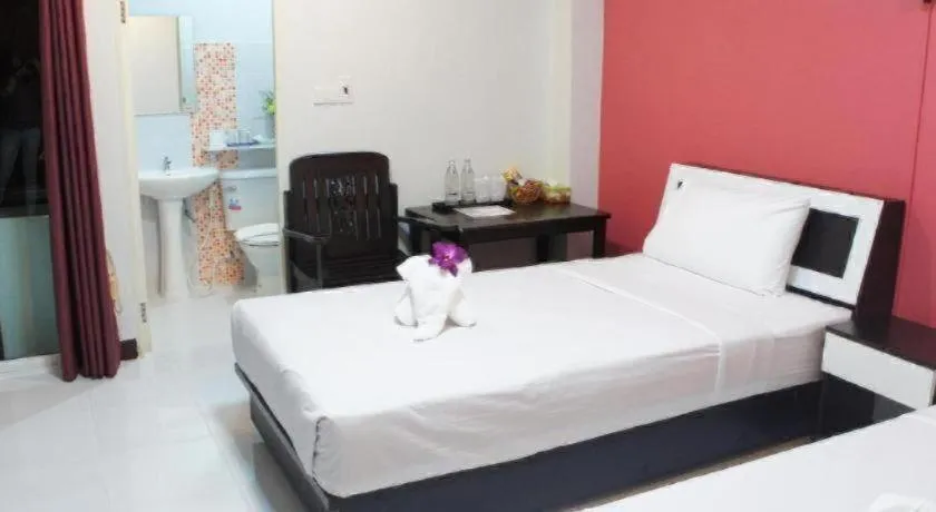 Bed in Nan Treasure Hotel