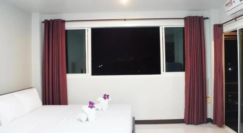 Bed in Nan Treasure Hotel