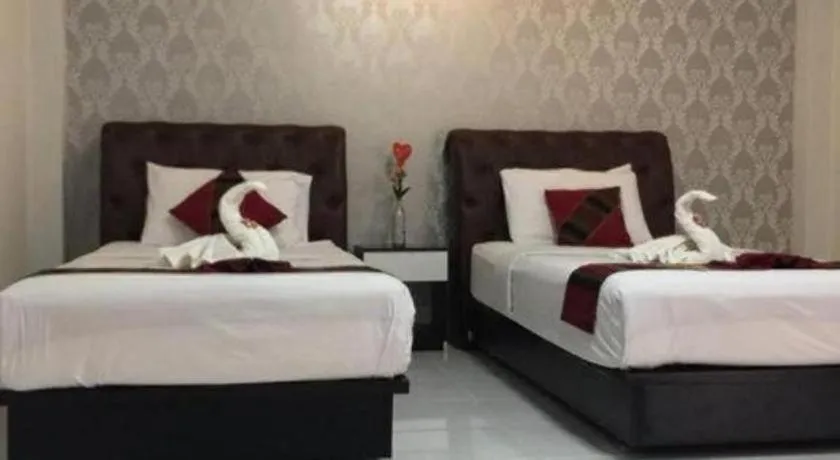 Bed in Nan Treasure Hotel